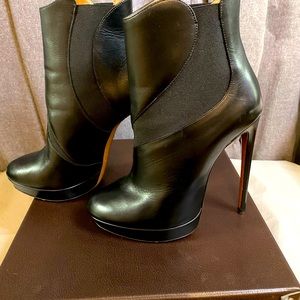 Alaïa black leather ankle boots